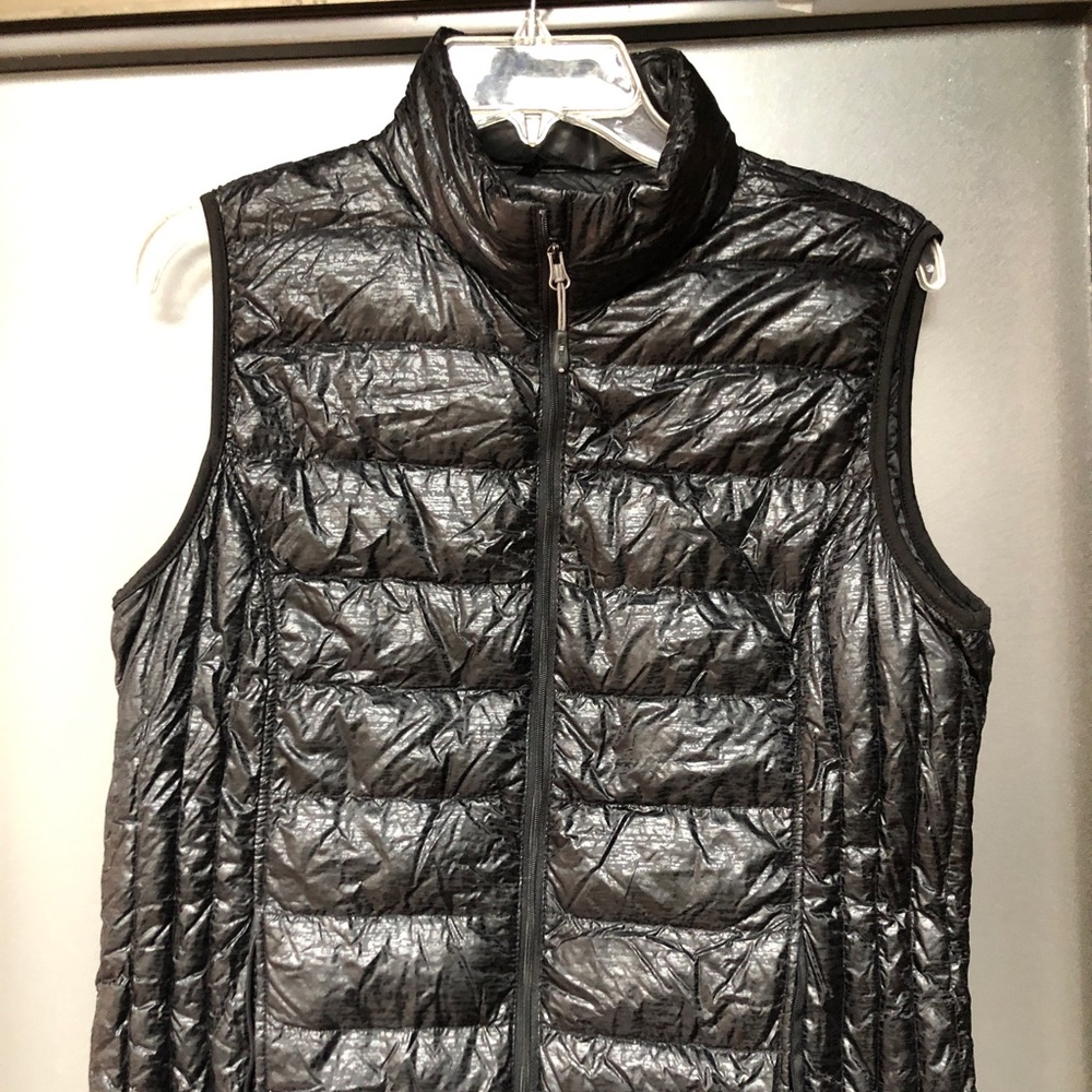 Size Large (unknown brand name) puffy vest.